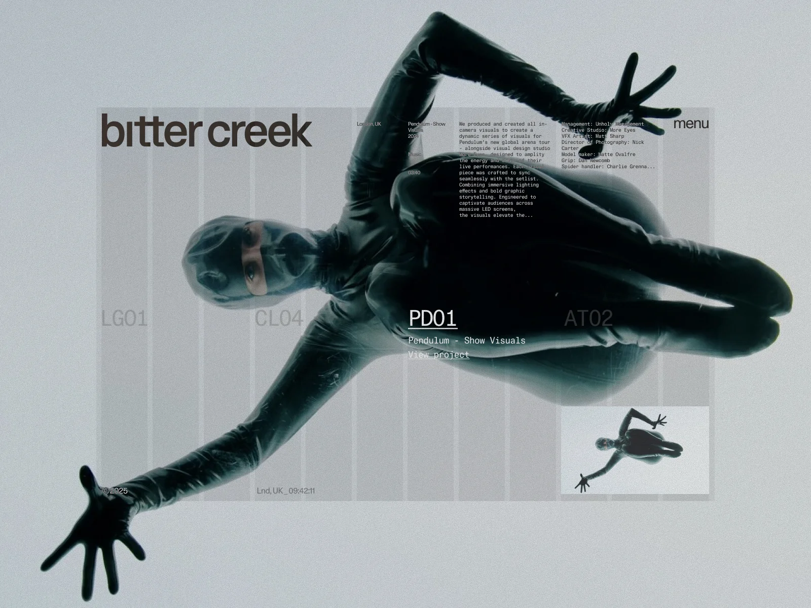 Bitter creek website with a diagonal hooded figure and project credits on a pale background
