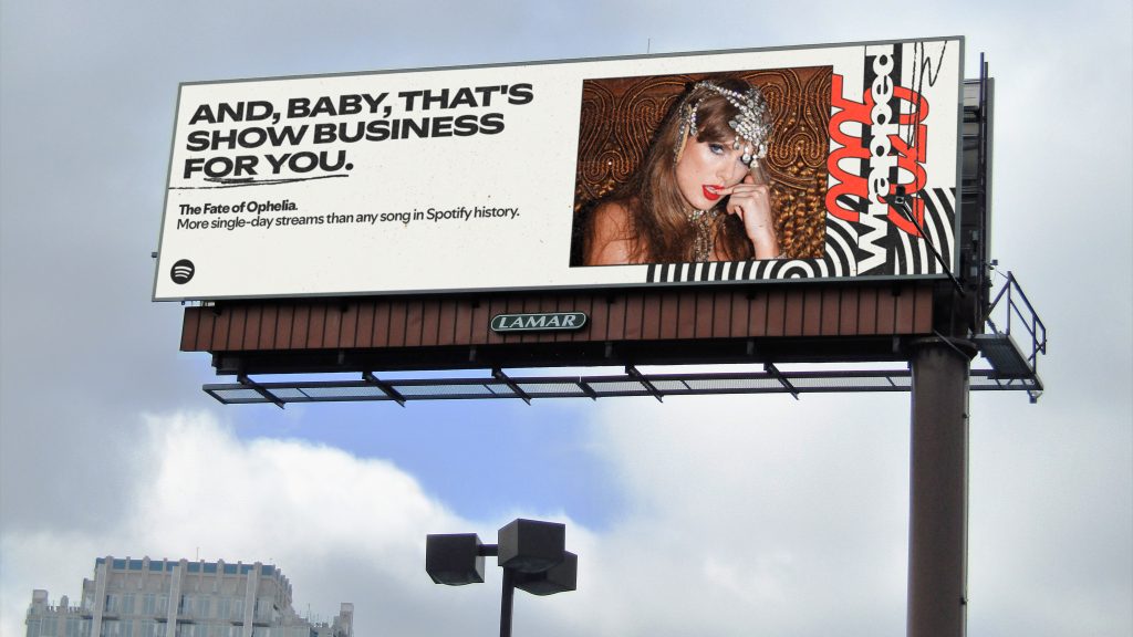Spotify Wrapped 2025 billboard in Nashville with an artist photograph and black typography